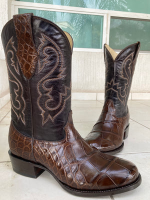 A pair of chocolate brown American alligator custom boots made using a customers own hide 