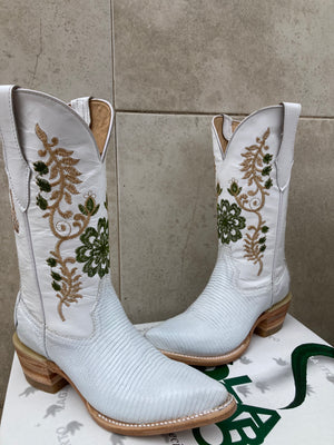 A custom made pair of white cowboy botos made for a wedding using white lizard skin with custom embroidery