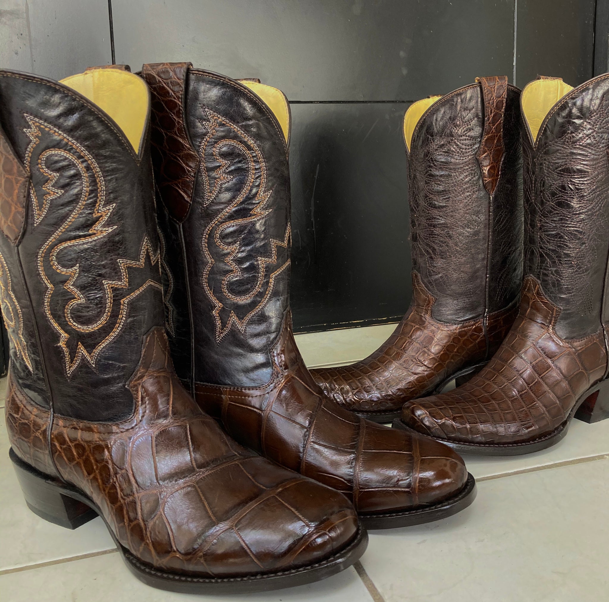 Two pairs of matching american alligator custom made boots using the customer´s own hide 