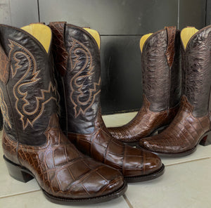 Two pairs of matching american alligator custom made boots using the customer´s own hide 